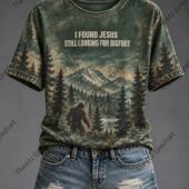 I Found Jesus Still Looking For Bigfoot Shirt 3 Green camouflage Bigfoot graphic t-shirt with mountain landscape