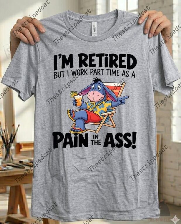 Grey t-shirt featuring Eeyore relaxing in a beach chair with humorous retirement text.