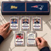 New England Patriots Topps sports card collection in display case