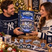 Couple holding a New York Yankees 2026 holiday advent calendar with baseball ornaments.