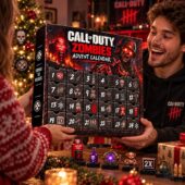 Man holding a Call of Duty Zombies Advent Calendar with collectible figures on a table