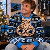 Man wearing Carolina Panthers holiday themed knitted sweater