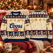 Front and back view of a Coors Banquet branded holiday sweater featuring snowflakes, deer, and beer cans.