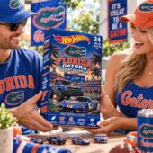 Florida Gators 24 Mini Car Collector Advent Calendar 2026 1 A man and a woman holding a Florida Gators Hot Wheels advent calendar featuring 24 die-cast vehicles.