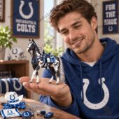 Man holding an Indianapolis Colts branded horse figurine in a fan-themed room