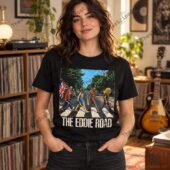 Woman wearing a black The Eddie Road heavy metal graphic t-shirt.