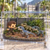 Jurassic World collectible scene featuring Owen Grady and velociraptors in an acrylic display case from TheStripedcat.