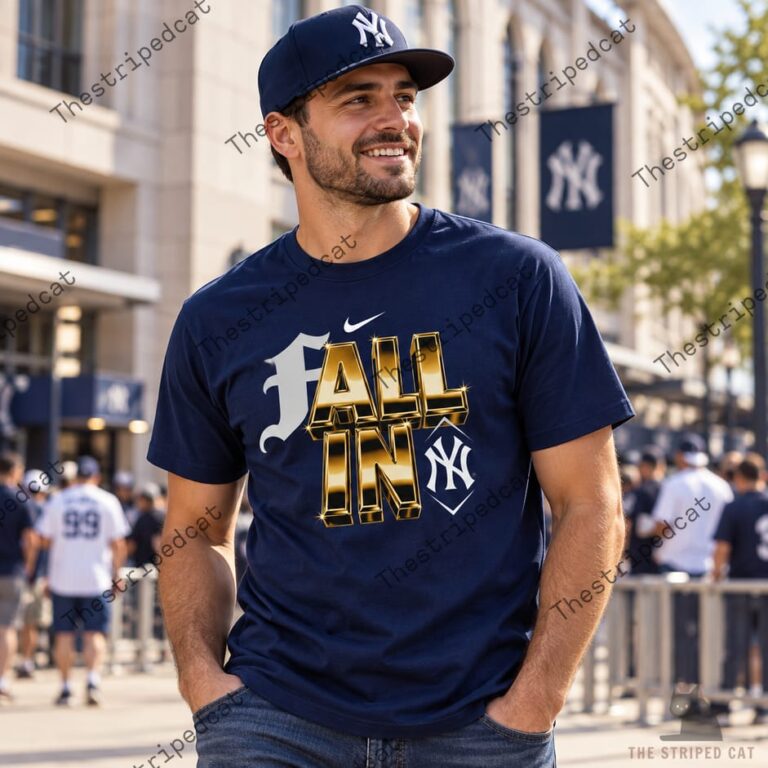 Man wearing a navy blue New York Yankees Fall In t-shirt and baseball cap