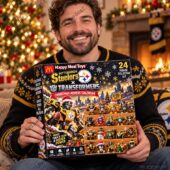Pittsburgh Steelers x Transformers Christmas Advent Calendar 2026 3 Man holding a Pittsburgh Steelers Transformers Advent Calendar