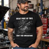 Man wearing a black t-shirt with an automotive engine diagram print.