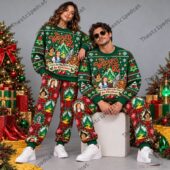 Couple wearing matching Wizard of Oz Christmas sweaters and pajamas from TheStripedcat